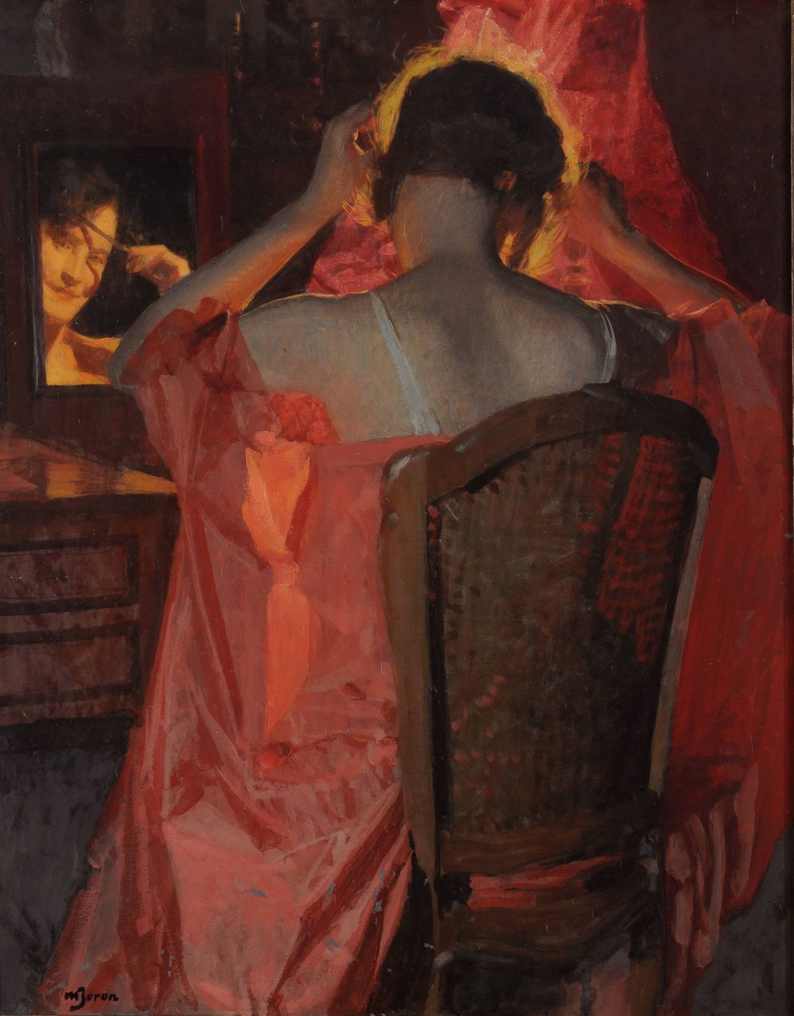 Jeune femme devant sa coiffeuse